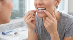 Apply teeth whitening strips properly at home